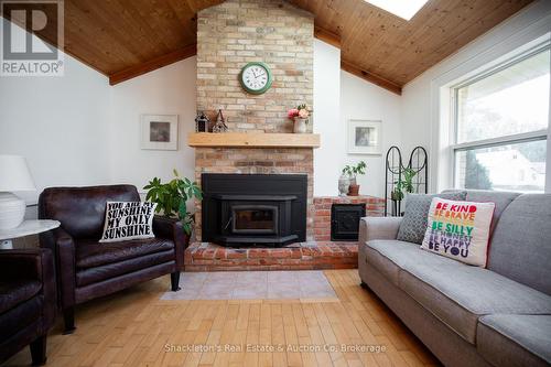 5990 Perth Line 8, Perth South (Blanshard), ON - Indoor Photo Showing Living Room With Fireplace