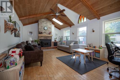 5990 Perth Line 8, Perth South (Blanshard), ON - Indoor Photo Showing Living Room With Fireplace