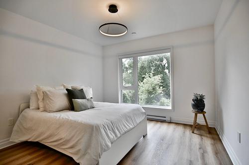 Primary bedroom - 102-2100 Rue Benoit, Saint-Bruno-De-Montarville, QC - Indoor Photo Showing Bedroom