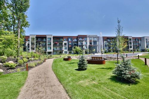 Backyard - 102-2100 Rue Benoit, Saint-Bruno-De-Montarville, QC - Outdoor