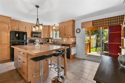 Cuisine - 31 Av. De Médoc, Candiac, QC - Indoor Photo Showing Other Room