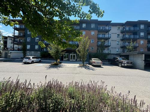 210-881 Academy Way, Kelowna, BC - Outdoor With Balcony With Facade