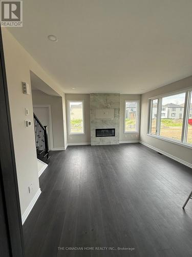 808 Anemone Mews, Ottawa, ON - Indoor Photo Showing Living Room With Fireplace