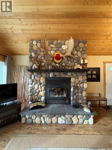 5 Sunset Drive, Cowan Lake, SK - Indoor Photo Showing Living Room With Fireplace