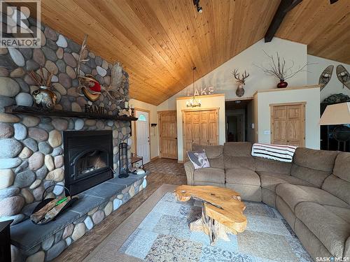 5 Sunset Drive, Cowan Lake, SK - Indoor Photo Showing Living Room With Fireplace