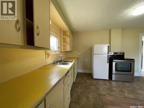 1432 105Th Street, North Battleford, SK - Indoor Photo Showing Kitchen With Double Sink