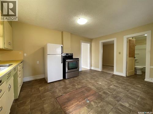 1432 105Th Street, North Battleford, SK - Indoor Photo Showing Kitchen With Double Sink