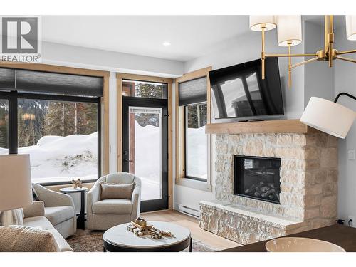 7005 Mcgillivray Lake Drive Unit# 16, Sun Peaks, BC - Indoor Photo Showing Living Room With Fireplace