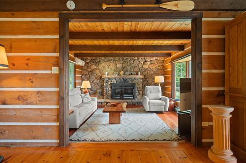 Salon - 249 Ch. Des Boisés, Mont-Tremblant, QC - Indoor With Fireplace