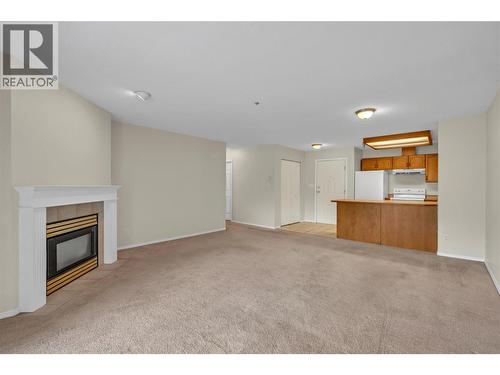 3310 Skaha Lake Road Unit# 306, Penticton, BC - Indoor With Fireplace