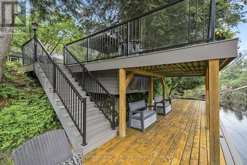 upper and lower decking at the waters edge - 103 Southbank Drive, Bracebridge (Draper), ON - Outdoor With Deck Patio Veranda With Exterior