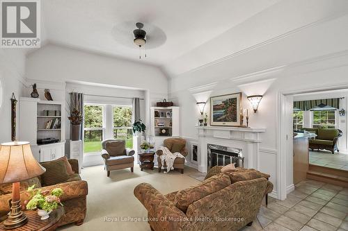 12 foot elevated ceiling in family room - 103 Southbank Drive, Bracebridge (Draper), ON - Indoor Photo Showing Living Room With Fireplace