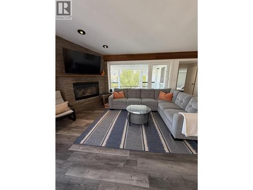 8807 Gala Crescent, Osoyoos, BC - Indoor Photo Showing Living Room With Fireplace