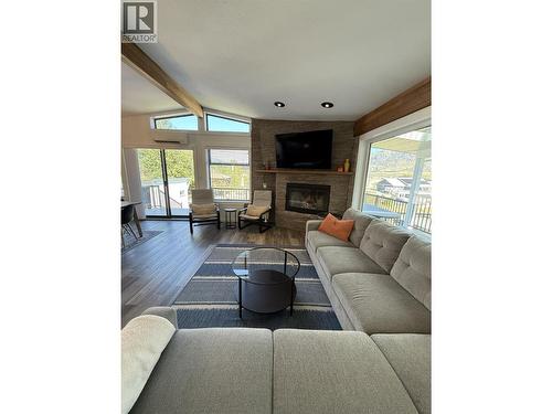8807 Gala Crescent, Osoyoos, BC - Indoor Photo Showing Living Room With Fireplace