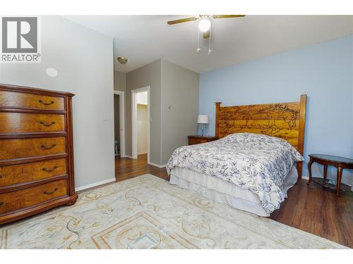 7630 97A Highway, Mara, BC - Indoor Photo Showing Bedroom
