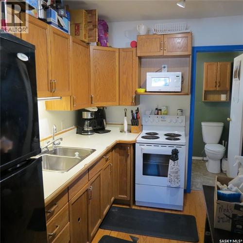 2256 Wascana Street, Regina, SK - Indoor Photo Showing Kitchen With Double Sink