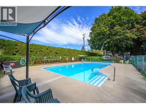 2100 43 Avenue Unit# 205, Vernon, BC - Outdoor With In Ground Pool