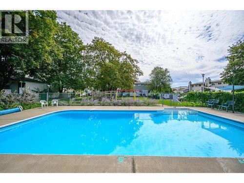 2100 43 Avenue Unit# 205, Vernon, BC - Outdoor With In Ground Pool With Backyard