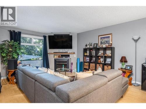 2100 43 Avenue Unit# 205, Vernon, BC - Indoor Photo Showing Living Room With Fireplace