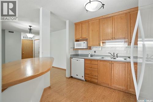 208 1735 Mckercher Drive, Saskatoon, SK - Indoor Photo Showing Kitchen With Double Sink