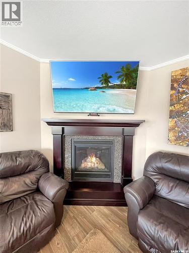 4 Pine Drive, Candle Lake, SK - Indoor Photo Showing Living Room With Fireplace