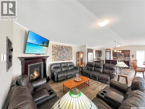 4 Pine Drive, Candle Lake, SK - Indoor Photo Showing Living Room With Fireplace