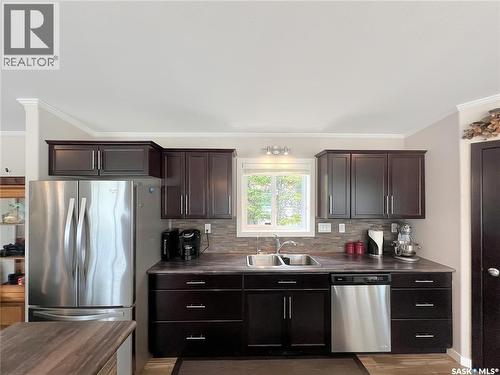 4 Pine Drive, Candle Lake, SK - Indoor Photo Showing Kitchen With Double Sink