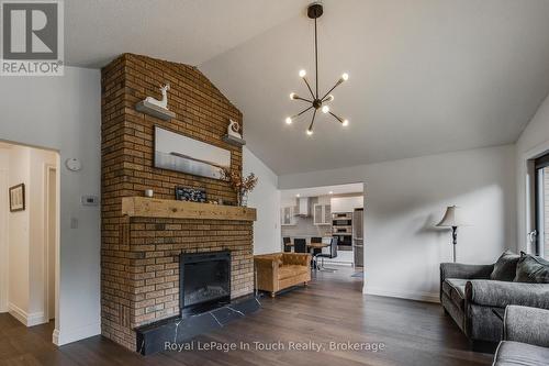 26 Glen Cedar Drive, Tiny, ON - Indoor Photo Showing Living Room With Fireplace