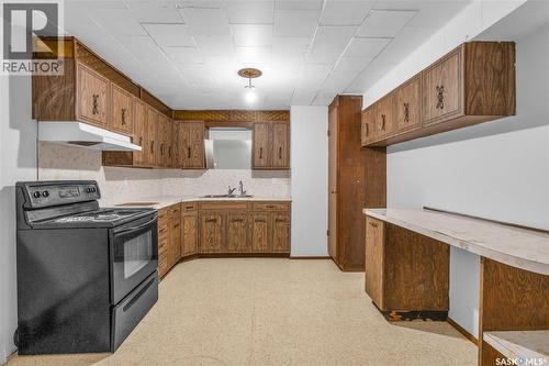 208 Lorne Street, Cupar, SK - Indoor Photo Showing Kitchen With Double Sink