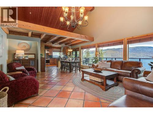 Open concept main floor with loft area. - 7172 Brent Road, Peachland, BC - Indoor Photo Showing Living Room