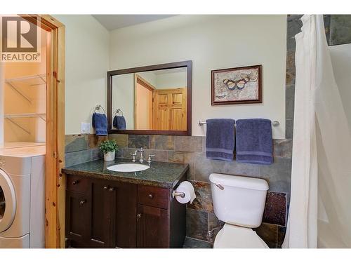 4 piece shared ensuite with access to laundry room. - 7172 Brent Road, Peachland, BC - Indoor