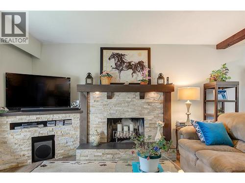 1205 Irene Road, Kelowna, BC - Indoor Photo Showing Living Room With Fireplace
