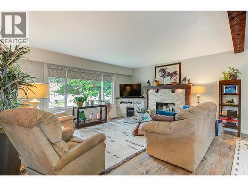 1205 Irene Road, Kelowna, BC - Indoor Photo Showing Living Room With Fireplace
