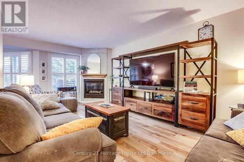 6 - 395 Springbank Avenue N, Woodstock (Woodstock - North), ON - Indoor Photo Showing Living Room With Fireplace