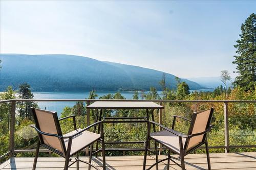 3135 Keniris Road, Nelson, BC - Outdoor With Body Of Water With Deck Patio Veranda With View