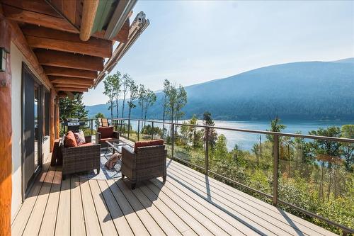 3135 Keniris Road, Nelson, BC - Outdoor With Body Of Water With Deck Patio Veranda With View With Exterior