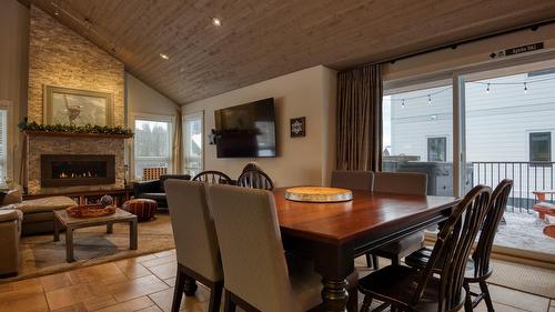 152 Clearview Crescent, Apex Mountain, BC - Indoor Photo Showing Dining Room With Fireplace