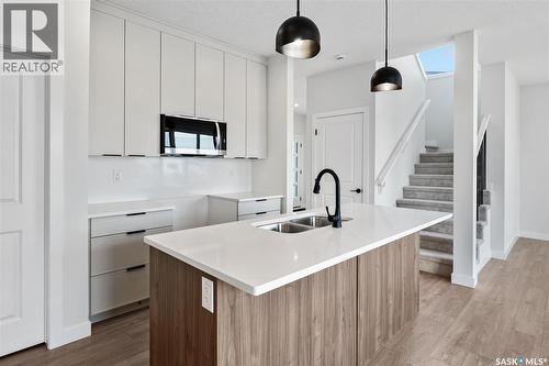 127 Katz Avenue, Saskatoon, SK - Indoor Photo Showing Kitchen With Double Sink