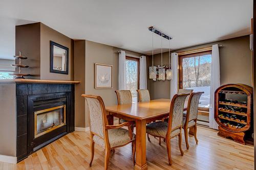 Salle à manger - 181 Mtée Victor-Nymark, Saint-Sauveur, QC - Indoor Photo Showing Dining Room With Fireplace
