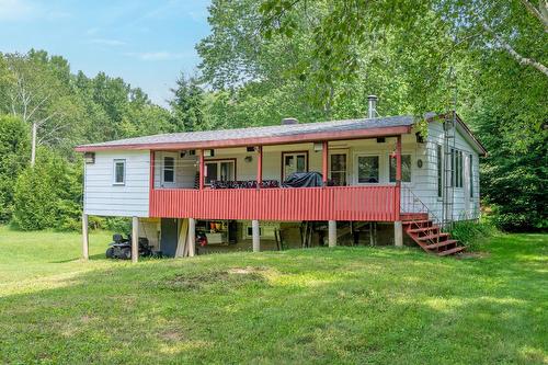Façade - 1932 Ch. De La Pointe-Bourgeois, La Conception, QC - Outdoor With Deck Patio Veranda