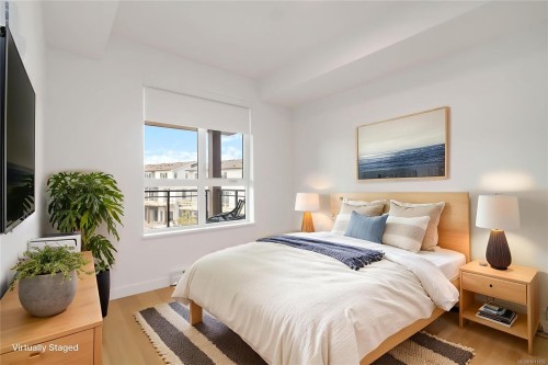 304-3564 A Ryder Hesjedal Way, Colwood, BC - Indoor Photo Showing Bedroom
