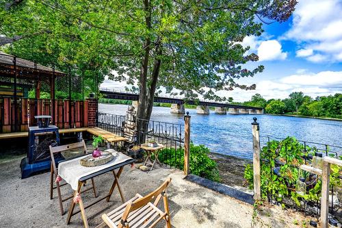 Backyard - 13 Rue Alfred, Laval (Sainte-Rose), QC - Outdoor With Body Of Water