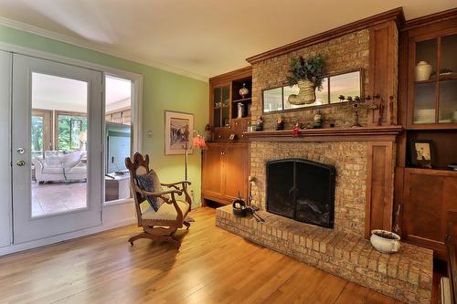 Living room - 60 Av. Des Rapides, Québec (Beauport), QC - Indoor Photo Showing Living Room With Fireplace