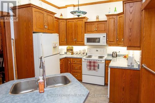 218 Woodstock Street N, East Zorra-Tavistock (Tavistock), ON - Indoor Photo Showing Kitchen With Double Sink