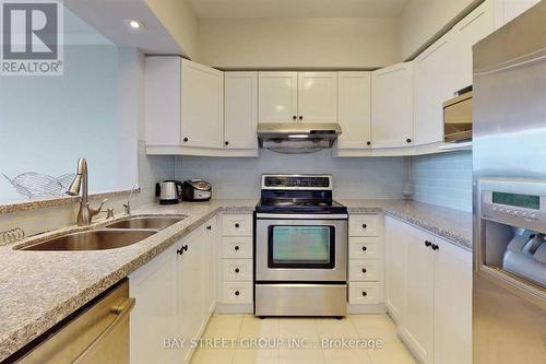 Ph12 - 2628 Mccowan Road, Toronto, ON - Indoor Photo Showing Kitchen With Double Sink