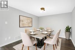 Virtually staged dining area - 