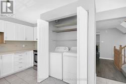 2nd floor laundry in kitchen - 