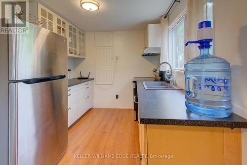 1180 Guigue Road, Frontenac, ON - Indoor Photo Showing Kitchen With Double Sink