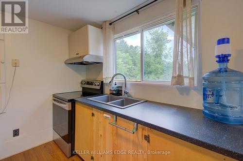 1180 Guigue Road, Frontenac, ON - Indoor Photo Showing Kitchen With Double Sink