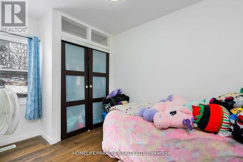 101 River Road E, Wasaga Beach, ON - Indoor Photo Showing Bedroom